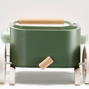 The Test Tiny Land® JoyRide Baby Walker with Blocks - Sage features white wheels, natural wood handles, and a green rectangular open compartment, shown against a plain white background.