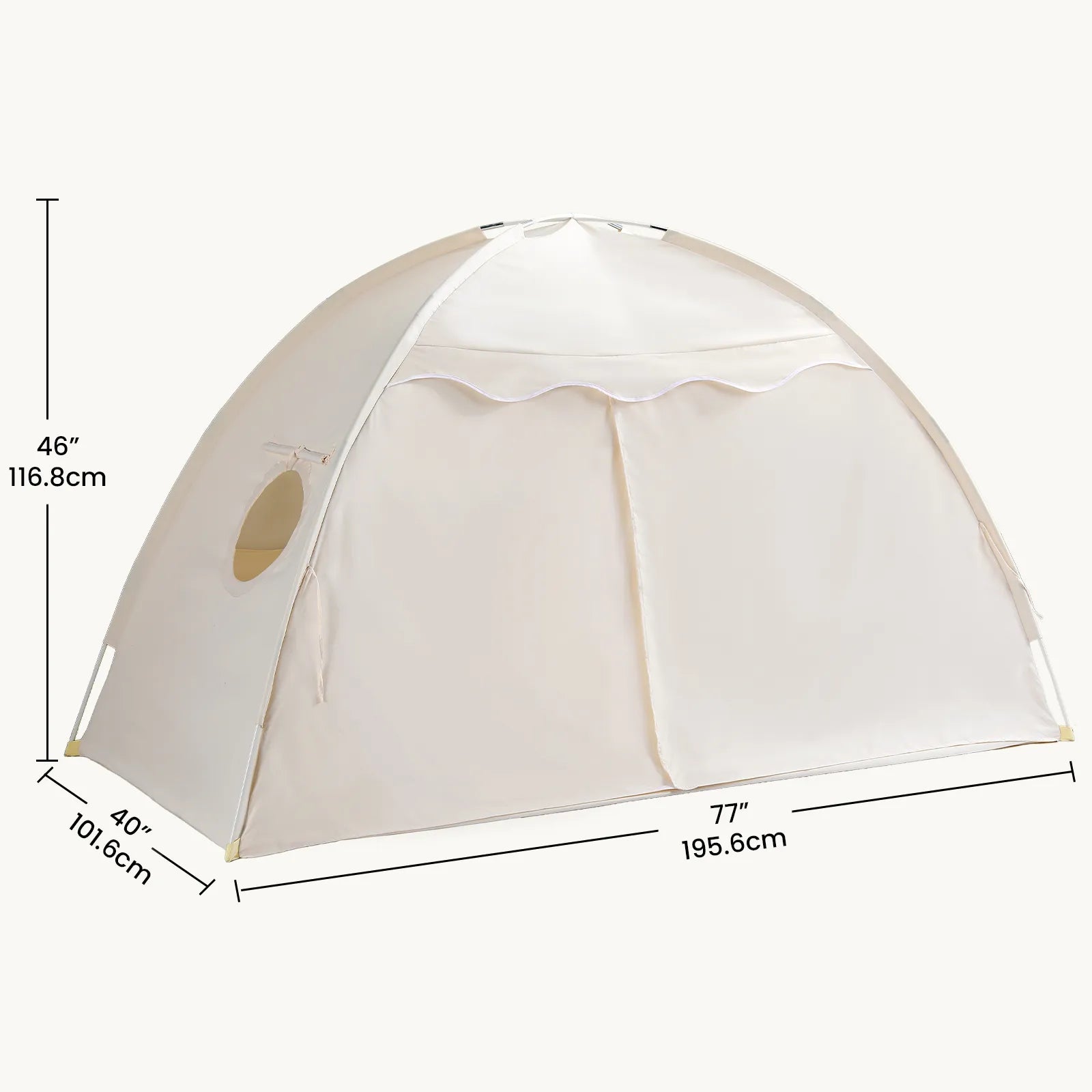 The Tiny Land® Kids Bed Tent by Tiny Land is a cream-colored indoor play tent with a round window and front flaps. Dimensions: 46 in (116.8 cm) high, 40 in (101.6 cm) deep, and 77 in (195.6 cm) wide.|Beige