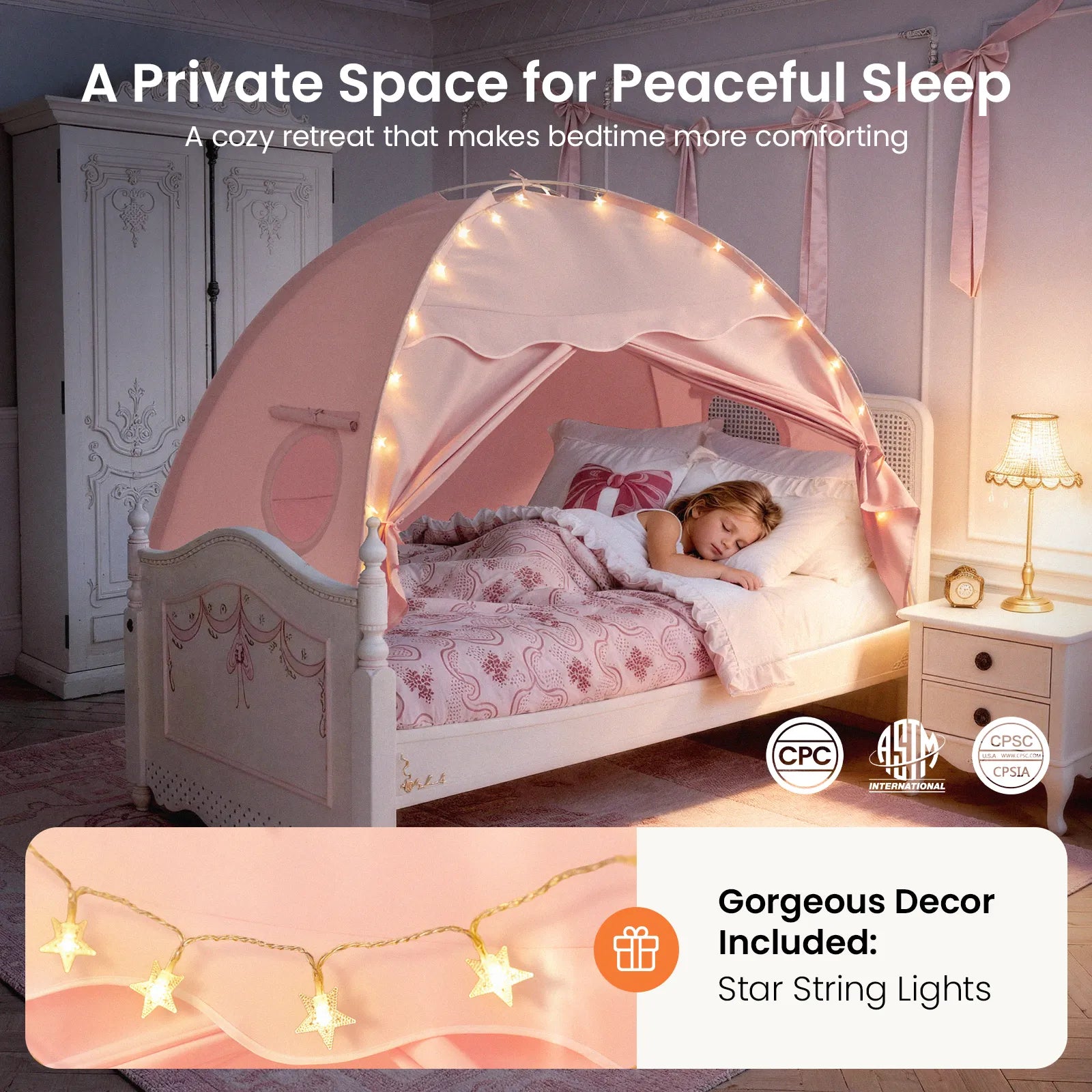 A young girl sleeps in a Tiny Land® Kids Bed Tent by Tiny Land, next to star-shaped string lights that add a cozy glow to her softly lit bedroom and create a magical, peaceful hideaway. Star string lights are featured as delightful decor.|Pink