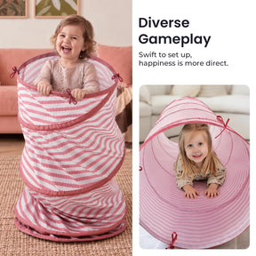 One child stands inside a tall, vertical pink and white striped Tiny Land® Adventure Play Tunnel, while another child crawls through the same tunnel laid horizontally.|Pink