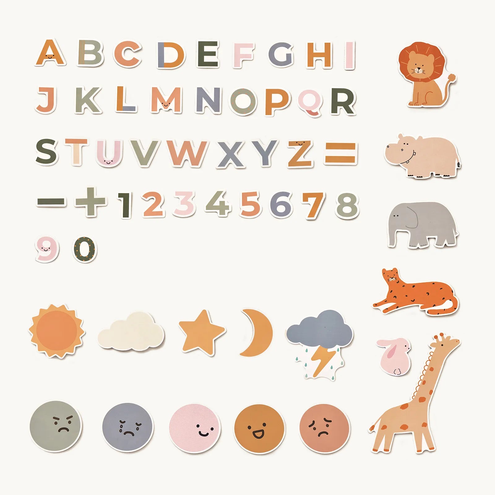 Pastel alphabet letters, numbers, math symbols, and a variety of animal, weather, and emotion face magnets are displayed on a light background as part of the Tiny Land® Double-Sided Arched Magnet Chalkboard & Art Kit by Tiny Land. Specially designed for inspiring creative play in children, these adorable magnets—including lion, hippo, elephant, cheetah, rabbit, and giraffe animals—are perfect for use with the magnetic chalkboard or any kids art easel.