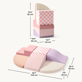 Tiny Land® PlayNest Climbing Blocks - Violet by Tiny Land is a children’s soft foam play set in pink, purple, cream, and beige. The set includes different shapes that can be arranged into a tower or a flat layout, making it perfect for use as an indoor obstacle course or toddler climbing toys. Measurements for each piece are provided in both centimeters and inches.