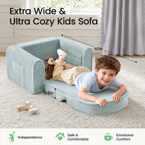 A smiling young boy relaxes on the Tiny Land® GentleSnug Corduroy Kid Chair in light blue, snuggling with a plush monkey toy. The comfy fold-out chair by Tiny Land sits in a bright room accented with a rug and toys. Text and icons showcase the chair’s generous width, cozy comfort, and standout features.|Soft Teal