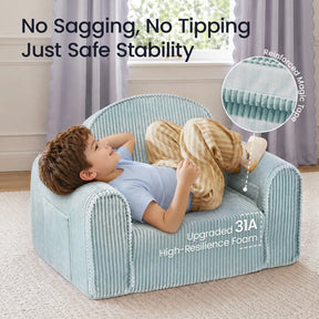 A young child relaxes on the Tiny Land® GentleSnug Corduroy Kid Chair by Tiny Land, featuring a light blue, ribbed foam design for stability, upgraded high-resilience foam for lasting comfort, and reinforced tape for durability. An inset highlights the easy-to-clean corduroy material of this toddler lounge chair.|Soft Teal