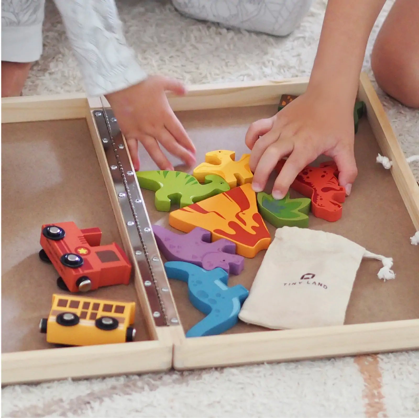 Tiny Land® Dinosaurs Wooden Take-Along Tabletop Train Set